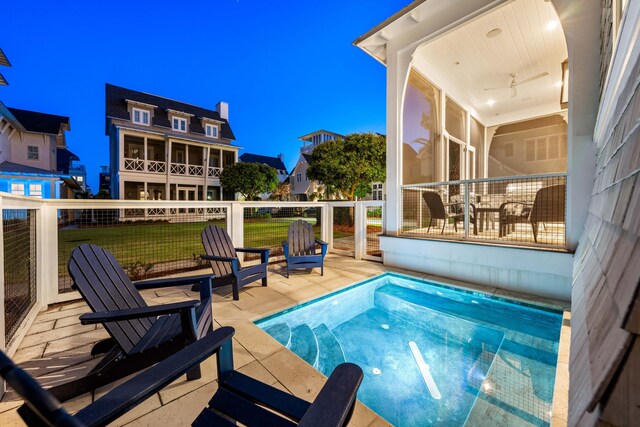 view of pool featuring a yard and a fenced in pool