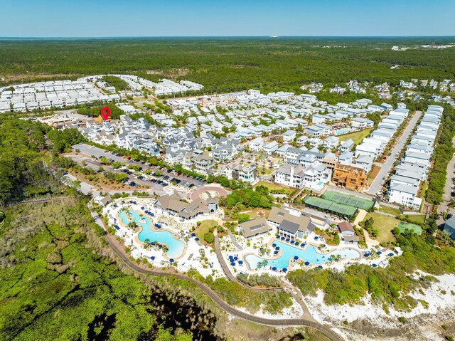 bird's eye view featuring a wooded view