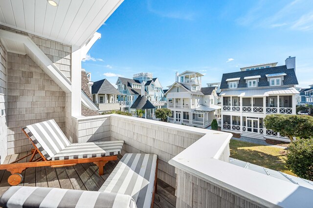 balcony featuring a residential view