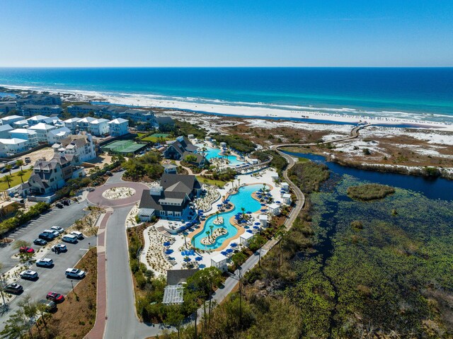 aerial view featuring a beach view and a water view