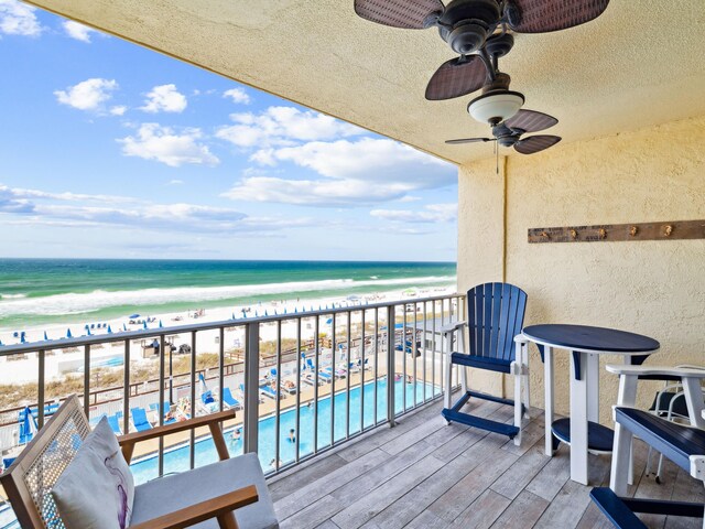 5801 Thomas Dr Unit 415, Panama City Beach, FL 32408 - balcony featuring a beach view, a water view, and ceiling fan