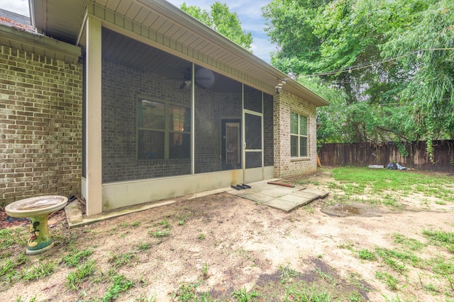 472 W College Blvd, Valparaiso, FL 32580 - fenced backyard with a sunroom