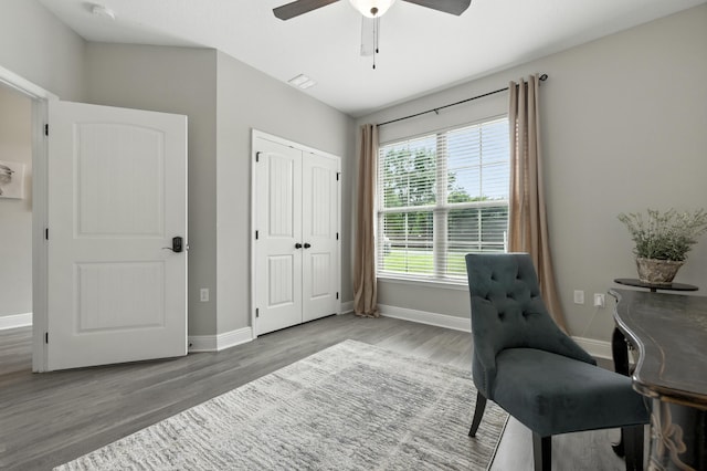 472 W College Blvd, Valparaiso, FL 32580 - office area with wood finished floors and a ceiling fan