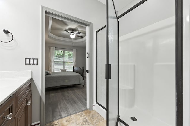 472 W College Blvd, Valparaiso, FL 32580 - full bath with a stall shower, a raised ceiling, ensuite bathroom, and vanity