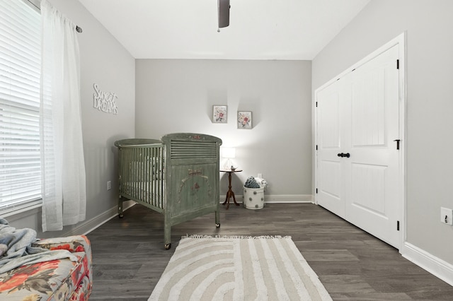 472 W College Blvd, Valparaiso, FL 32580 - bedroom with wood finished floors and a ceiling fan