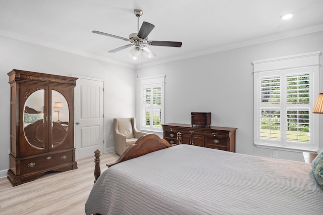 85 Stonegate Dr, Santa Rosa Beach, FL 32459 - bedroom featuring recessed lighting, light wood-style flooring, crown molding, and a ceiling fan