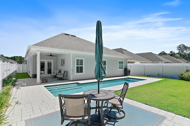 85 Stonegate Dr, Santa Rosa Beach, FL 32459 - view of pool with a fenced backyard, a patio area, ceiling fan, french doors, and a lawn