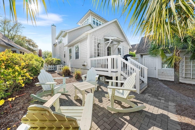 265 Salt Box Ln, Watersound, FL 32461 - view of patio featuring fence and an outbuilding