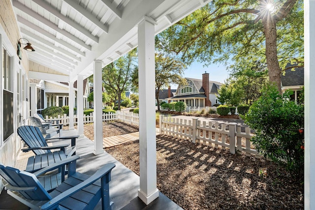 265 Salt Box Ln, Watersound, FL 32461 - view of patio / terrace featuring a porch and fence