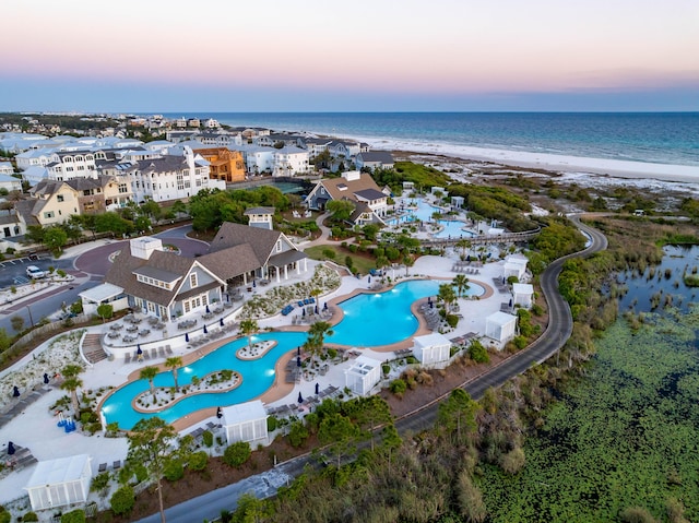 265 Salt Box Ln, Watersound, FL 32461 - aerial view at dusk featuring a beach view and a water view