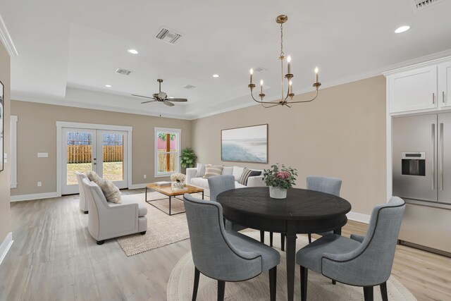 4003 Tarpon St, Panama City Beach, FL 32408 - dining room with light wood finished floors, recessed lighting, a raised ceiling, visible vents, and baseboards