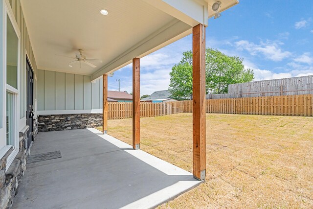 4003 Tarpon St, Panama City Beach, FL 32408 - view of patio / terrace with a ceiling fan and a fenced backyard