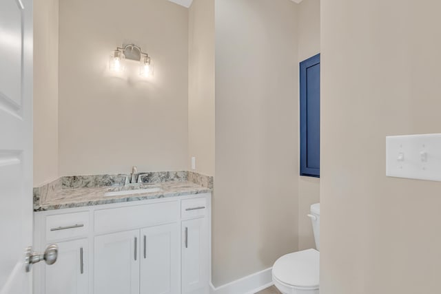 4003 Tarpon St, Panama City Beach, FL 32408 - half bath featuring baseboards, toilet, and vanity