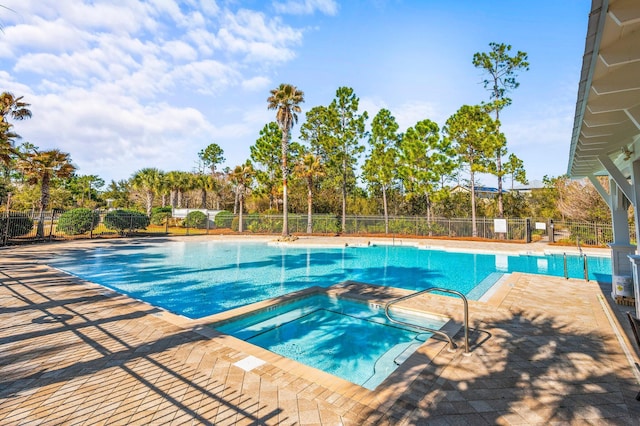 116 Prairie Pass, Santa Rosa Beach, FL 32459 - community pool featuring a hot tub, fence, and a patio area