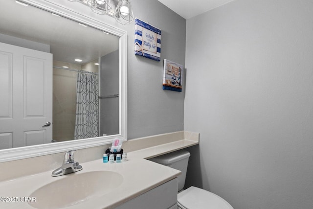 9900 S Thomas Dr Unit 1408, Panama City Beach, FL 32408 - full bath featuring a shower with curtain, vanity, and toilet