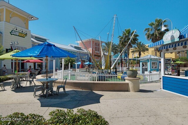 9900 S Thomas Dr Unit 1408, Panama City Beach, FL 32408 - surrounding community featuring fence private yard