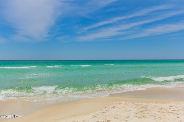 view of water feature with a beach view