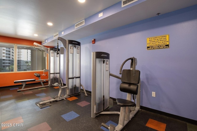 gym with visible vents and recessed lighting