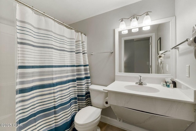 9900 S Thomas Dr Unit 1410, Panama City Beach, FL 32408 - full bath with vanity, toilet, and curtained shower
