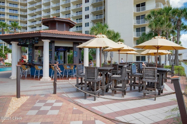 9900 S Thomas Dr Unit 1410, Panama City Beach, FL 32408 - view of patio / terrace featuring an outdoor bar and a gazebo