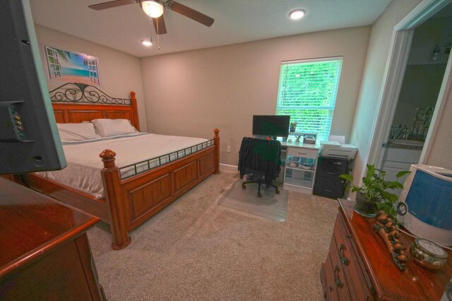 5594 Riviera Dr, Milton, FL 32583 - bedroom with recessed lighting, connected bathroom, ceiling fan, and light carpet