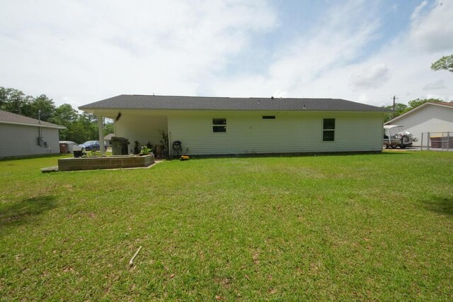 5594 Riviera Dr, Milton, FL 32583 - back of house with a yard