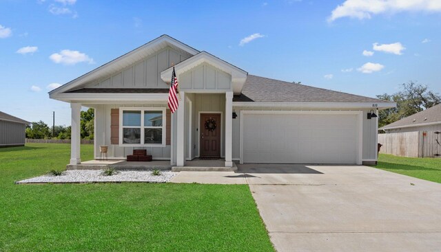 810 Otto Loop, Crestview, FL 32539 - single story home featuring roof with shingles, concrete driveway, a garage, a front lawn, and board and batten siding