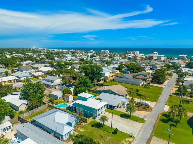 bird's eye view featuring a water view and a residential view