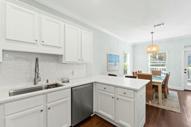 kitchen featuring a sink, tasteful backsplash, visible vents, a peninsula, and stainless steel dishwasher