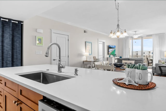 1110 Santa Rosa Blvd Unit A616, Fort Walton Beach, FL 32548 - kitchen with light countertops, dishwasher, visible vents, a sink, and decorative light fixtures