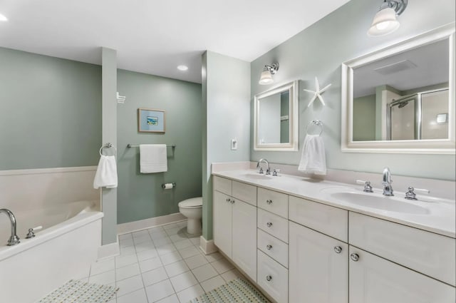 1110 Santa Rosa Blvd Unit A616, Fort Walton Beach, FL 32548 - bathroom with toilet, tile patterned flooring, a sink, and double vanity