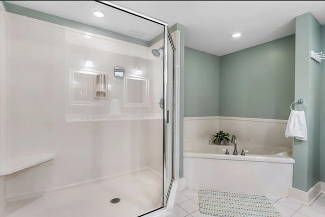 1110 Santa Rosa Blvd Unit A616, Fort Walton Beach, FL 32548 - full bath featuring a bath, tile patterned flooring, a shower stall, and recessed lighting