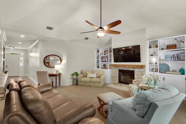 living area with baseboards, carpet, a ceiling fan, and visible vents