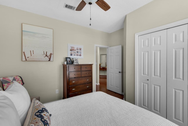 bedroom featuring a ceiling fan, a closet, and visible vents
