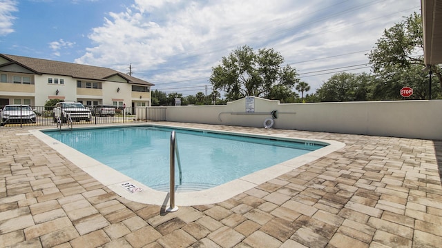 995 Airport Rd Unit 41, Destin, FL 32541 - community pool with fence and a patio area