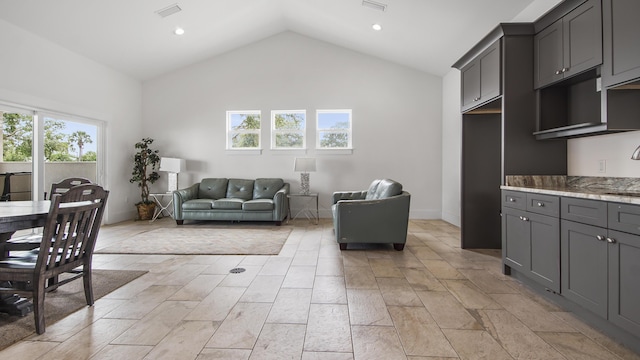 995 Airport Rd Unit 41, Destin, FL 32541 - living room with vaulted ceiling and recessed lighting