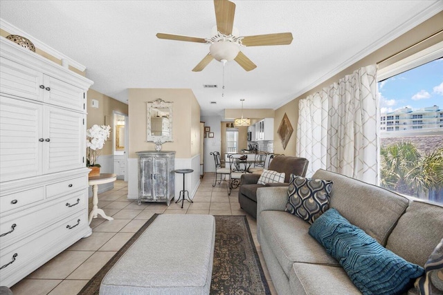 300 Gulf Shore Dr Unit 308, Destin, FL 32541 - living room featuring ceiling fan, light tile patterned floors, and plenty of natural light