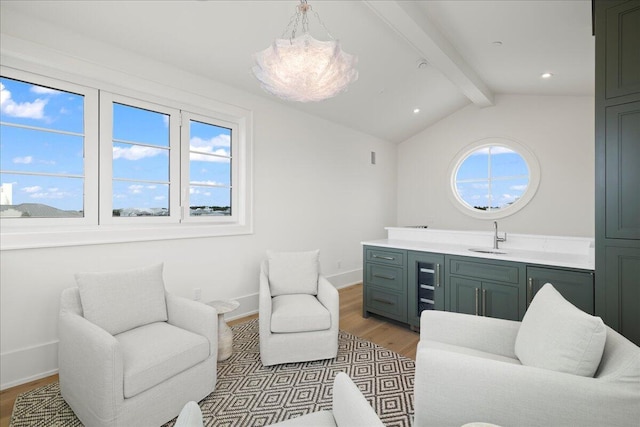 160 Heritage Dunes Ln S, Santa Rosa Beach, FL 32459 - interior space with wine cooler, a wealth of natural light, light wood finished floors, and vaulted ceiling with beams