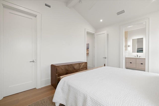 160 Heritage Dunes Ln S, Santa Rosa Beach, FL 32459 - bedroom featuring ensuite bathroom, visible vents, wood finished floors, and lofted ceiling with beams