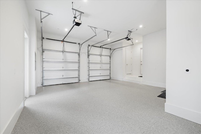 160 Heritage Dunes Ln S, Santa Rosa Beach, FL 32459 - garage with recessed lighting, baseboards, and a garage door opener