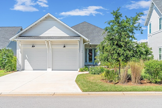 90 Basal St, Inlet Beach, FL 32461 - traditional home with an attached garage, driveway, and roof with shingles