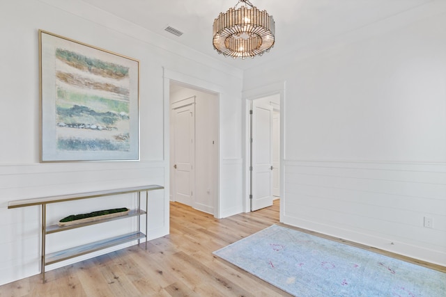 90 Basal St, Inlet Beach, FL 32461 - hall with a chandelier and light wood-style flooring