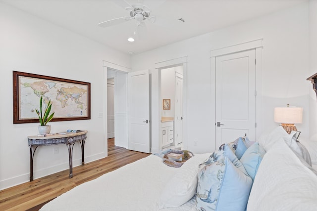 90 Basal St, Inlet Beach, FL 32461 - bedroom featuring wood finished floors, baseboards, recessed lighting, connected bathroom, and a ceiling fan