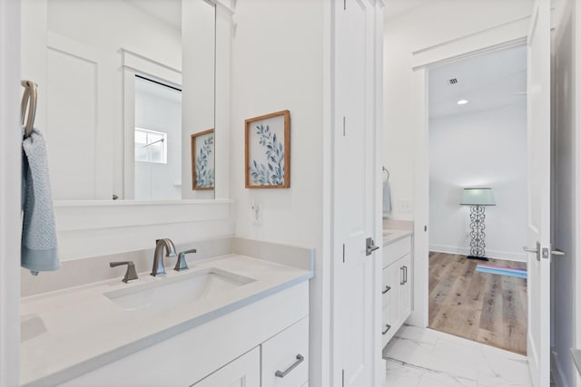 90 Basal St, Inlet Beach, FL 32461 - bathroom featuring vanity and marble look tiles