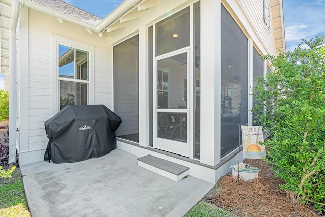90 Basal St, Inlet Beach, FL 32461 - view of patio featuring a sunroom and grilling area