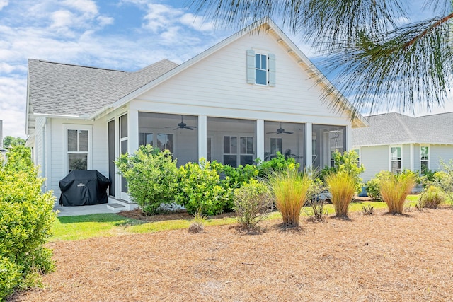 90 Basal St, Inlet Beach, FL 32461 - view of front of property with a ceiling fan, roof with shingles, and a sunroom