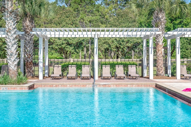 90 Basal St, Inlet Beach, FL 32461 - community pool featuring a pergola, fence, and view of scattered trees