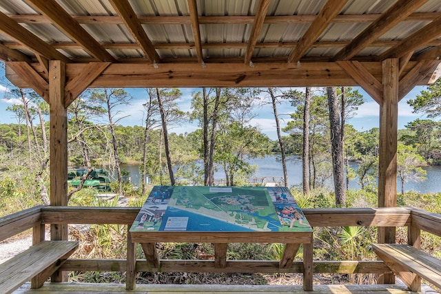 90 Basal St, Inlet Beach, FL 32461 - deck featuring a water view and view of wooded area