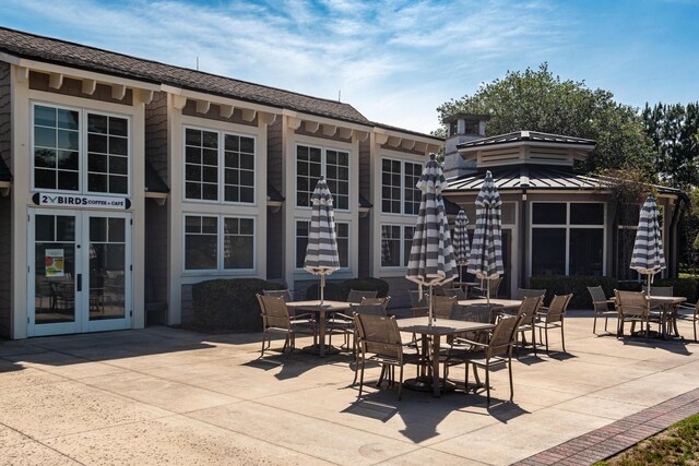 90 Basal St, Inlet Beach, FL 32461 - view of patio with french doors and outdoor dining space