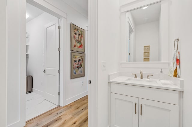 90 Basal St, Inlet Beach, FL 32461 - bathroom with wood finished floors, vanity, and baseboards